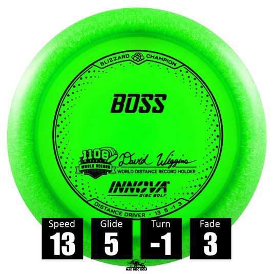 Disco de disc golf Innova Boss de plástico Champion Blizzard, con números de vuelo: velocidad 13, planeo 5, giro -1 y desvanecimiento 3.